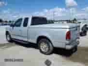 2002 Ford F-150 XL z VIN 1FTRX17W82NB59499, wystawiony jako Copart lot #85295365 z przebiegiem 191 328 mil mil oraz Szkoda całkowita • Salvage title. Historia ofert i sprzedaży dostępna na DreamBid. Obrazek 2.