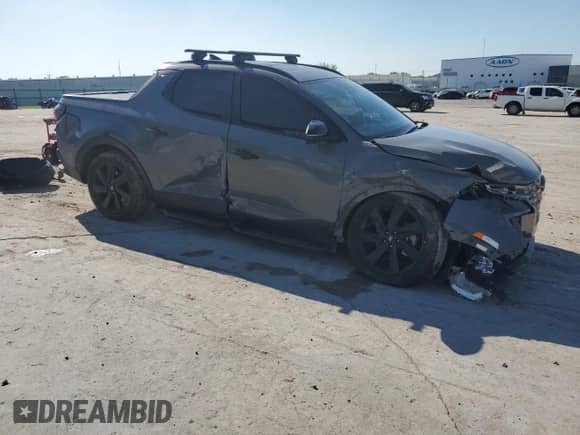2024 Hyundai Santa Cruz Night Edition с VIN 5NTJCDDF1RH108789, выставлен на аукционе Copart как лот 71300495 с пробегом 22 315 миль миль и Списание • Salvage title. История ставок и продаж доступна на DreamBid. Изображение 4.