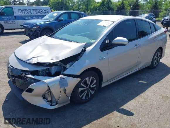 2018 Toyota Prius Plus z VIN JTDKARFP0J3075649, wystawiony jako IAAI lot #42569053 z przebiegiem 99 581 mil mil oraz . Historia ofert i sprzedaży dostępna na DreamBid. Obrazek 17.