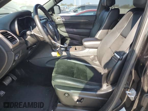 2015 Jeep Grand Cherokee Altitude with VIN 1C4RJFAG0FC742506, listed as a Copart auction lot 68986094 with 101,564 mi miles and Salvage title. Bid and sale history available at DreamBid. Image 7.