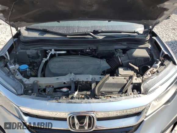 2021 Honda Pilot Touring 7-Passenger z VIN 5FNYF6H63MB025849, wystawiony jako Copart lot #60432205 z przebiegiem 78 277 mil mil oraz Czysty tytuł • Clean title. Historia ofert i sprzedaży dostępna na DreamBid. Obrazek 12.