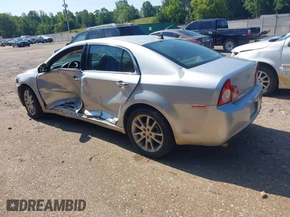 2012 Chevrolet Malibu LTZ z VIN 1G1ZG5E7XCF271129, wystawiony jako IAAI lot #42713063 z przebiegiem 127 511 mil mil oraz . Historia ofert i sprzedaży dostępna na DreamBid. Obrazek 3.