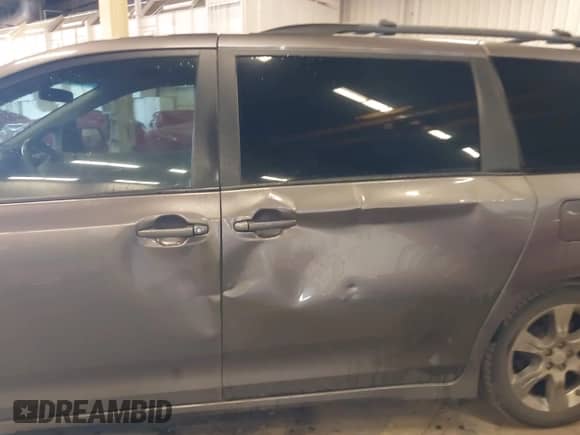 2011 Toyota Sienna SE with VIN 5TDXK3DC7BS034516, listed as a IAAI auction lot 41539955 with 209,309 mi miles and . Bid and sale history available at DreamBid. Image 20.