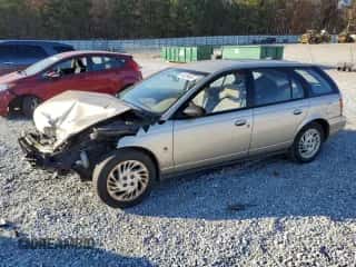 1999 Saturn SW z VIN 1G8ZK8277XZ162136, wystawiony jako Copart lot #83206604 z przebiegiem Nie podano mil oraz Szkoda całkowita • Salvage title. Historia ofert i sprzedaży dostępna na DreamBid. Obrazek 1.