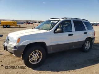 2003 Jeep Grand Cherokee Laredo with VIN 1J4GW48N03C602964, listed as a Copart auction lot 78826814 with Not provided miles and Salvage title. Bid and sale history available at DreamBid. Image 1.