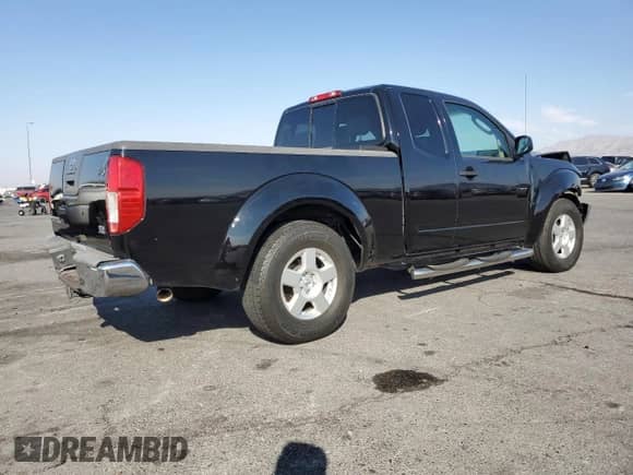 2007 Nissan Frontier SE with VIN 1N6AD06U77C458580, listed as a Copart auction lot 67972415 with 142,295 mi miles and Salvage title. Bid and sale history available at DreamBid. Image 3.
