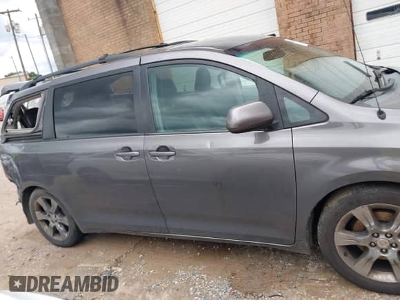 2012 Toyota Sienna SE with VIN 5TDXK3DC2CS235211, listed as a IAAI auction lot 42390354 with 242,602 mi miles and . Bid and sale history available at DreamBid. Image 14.
