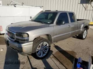 2002 GMC Sierra 1500 Denali z VIN 2GTFK69U221327164, wystawiony jako Copart lot #77172244 z przebiegiem 230 502 mil mil oraz Czysty tytuł • Clean title. Historia ofert i sprzedaży dostępna na DreamBid. Obrazek 1.