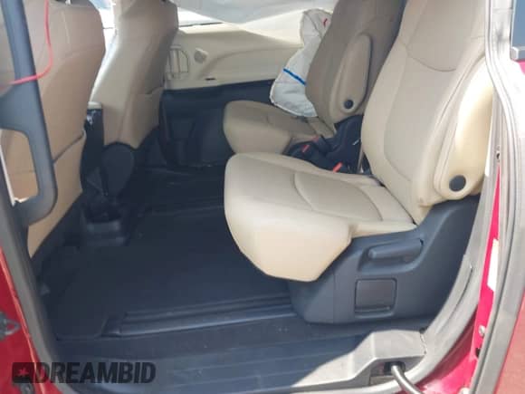 2023 Toyota Sienna XLE with VIN 5TDYRKECXPS152995, listed as a IAAI auction lot 42982758 with 28,651 mi miles and . Bid and sale history available at DreamBid. Image 8.