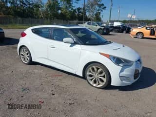 2012 Hyundai Veloster w/Red Int с VIN KMHTC6AD6CU028161, выставлен на аукционе IAAI как лот 43564329 с пробегом 98 673 миль миль и . История ставок и продаж доступна на DreamBid. Изображение 1.