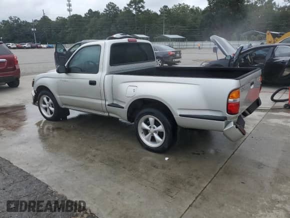 2002 Toyota Tacoma с VIN 5TENL42N42Z010806, выставлен на аукционе Copart как лот 84645105 с пробегом 199 343 миль миль и Списание • Salvage title. История ставок и продаж доступна на DreamBid. Изображение 2.