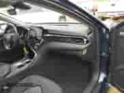 2021 Toyota Camry LE with VIN 4T1C11AK8MU548158, listed as a IAAI auction lot 43333222 with 34,824 mi miles and . Bid and sale history available at DreamBid. Image 5.