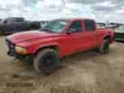2004 Dodge Dakota Sport z VIN 1D7HL38N44S768544, wystawiony jako Copart lot #56391635 z przebiegiem 148 938 mil mil oraz Szkoda całkowita • Salvage title. Historia ofert i sprzedaży dostępna na DreamBid. Obrazek 1.
