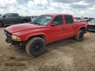 2004 Dodge Dakota Sport z VIN 1D7HL38N44S768544, wystawiony jako Copart lot #56391635 z przebiegiem 148 938 mil mil oraz Szkoda całkowita • Salvage title. Historia ofert i sprzedaży dostępna na DreamBid. Obrazek 1.