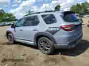 2023 Honda Pilot Elite with VIN 5FNYG1H82PB034130, listed as a Copart auction lot 56763214 with 7,710 mi miles and Salvage title. Bid and sale history available at DreamBid. Image 2.