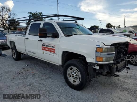 2015 Chevrolet Silverado 2500HD Work Truck z VIN 1GC1CUEG1FF636411, wystawiony jako Copart lot #63371555 z przebiegiem 68 441 mil mil oraz Szkoda całkowita • Salvage title. Historia ofert i sprzedaży dostępna na DreamBid. Obrazek 4.