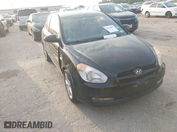 2007 Hyundai Accent SE z VIN KMHCN36C27U029743, wystawiony jako IAAI lot #42270837 z przebiegiem 103 967 mil mil oraz . Historia ofert i sprzedaży dostępna na DreamBid. Obrazek 1.