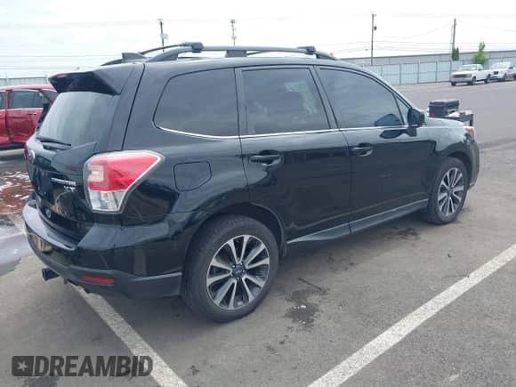 2018 Subaru Forester Premium with VIN JF2SJGECXJH524164, listed as a IAAI auction lot 42193260 with 172,304 mi miles and . Bid and sale history available at DreamBid. Image 4.