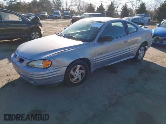 2000 Pontiac Grand Am with VIN 1G2NF12E1YM848643, listed as a IAAI auction lot 41836608 with 244,379 mi miles and . Bid and sale history available at DreamBid. Image 2.