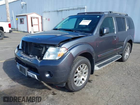 2011 Nissan Pathfinder LE z VIN 5N1AR1NB9BC616447, wystawiony jako IAAI lot #42489829 z przebiegiem 133 240 mil mil oraz . Historia ofert i sprzedaży dostępna na DreamBid. Obrazek 18.