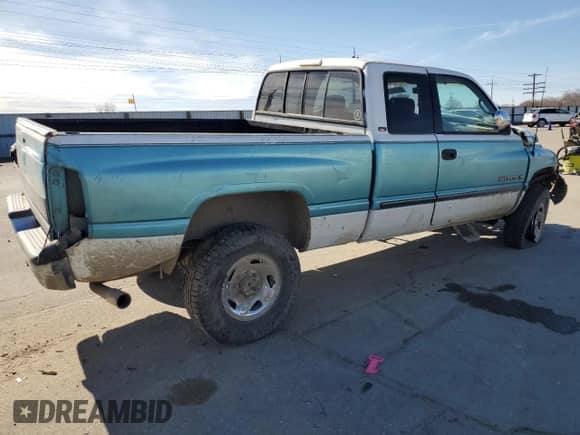 1996 Dodge 2500 with VIN 1B7KF23Z1TJ132910, listed as a Copart auction lot 48693455 with 253,645 mi miles and Salvage title. Bid and sale history available at DreamBid. Image 3.