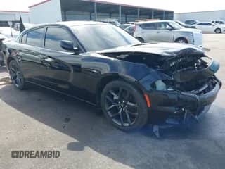 2023 Dodge Charger SXT with VIN 2C3CDXBG9PH556676, listed as a IAAI auction lot 43395257 with 48,866 mi miles and . Bid and sale history available at DreamBid. Image 1.