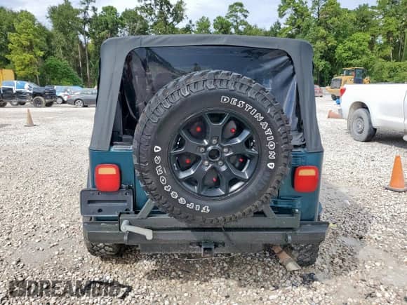 1999 Jeep Wrangler Sport with VIN 1J4FY19S7XP435204, listed as a Copart auction lot 83820835 with 263,738 mi miles and Clean title. Bid and sale history available at DreamBid. Image 6.