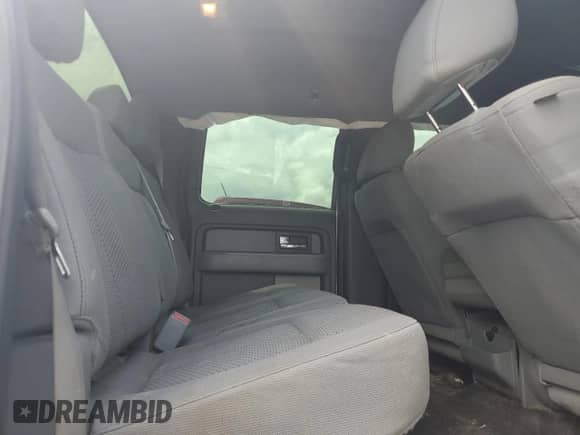 2013 Ford F-150 FX4 с VIN 1FTFW1EF8DKD29759, выставлен на аукционе Copart как лот 68283585 с пробегом 166 072 миль миль и Списание • Salvage title. История ставок и продаж доступна на DreamBid. Изображение 10.