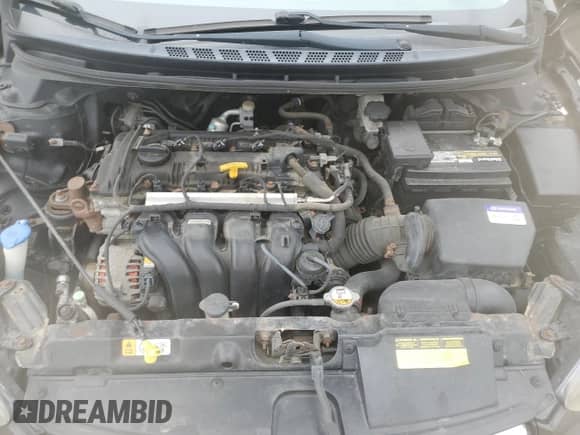 2013 Hyundai Elantra GLS z VIN KMHDH4AE0DU628551, wystawiony jako Copart lot #59375705 z przebiegiem 120 722 mil mil oraz Szkoda całkowita • Salvage title. Historia ofert i sprzedaży dostępna na DreamBid. Obrazek 11.