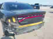 2015 Dodge Charger SE with VIN 2C3CDXBGXFH735601, listed as a IAAI auction lot 43106037 with 116,702 mi miles and . Bid and sale history available at DreamBid. Image 6.