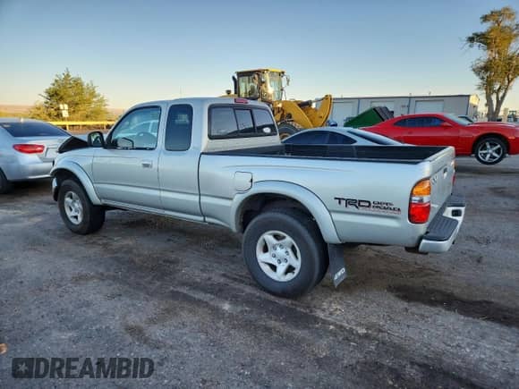 2003 Toyota Tacoma с VIN 5TEWN72NX3Z169900, выставлен на аукционе Copart как лот 80575545 с пробегом Не указан миль и Списание • Salvage title. История ставок и продаж доступна на DreamBid. Изображение 2.