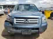 2006 Honda Pilot EX-L z VIN 5FNYF28796B009675, wystawiony jako Copart lot #55853665 z przebiegiem 161 808 mil mil oraz Szkoda całkowita • Salvage title. Historia ofert i sprzedaży dostępna na DreamBid. Obrazek 5.