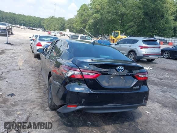 2022 Toyota Camry Hybrid LE with VIN 4T1C31AK2NU575304, listed as a IAAI auction lot 43017963 with 165,647 mi miles and . Bid and sale history available at DreamBid. Image 3.