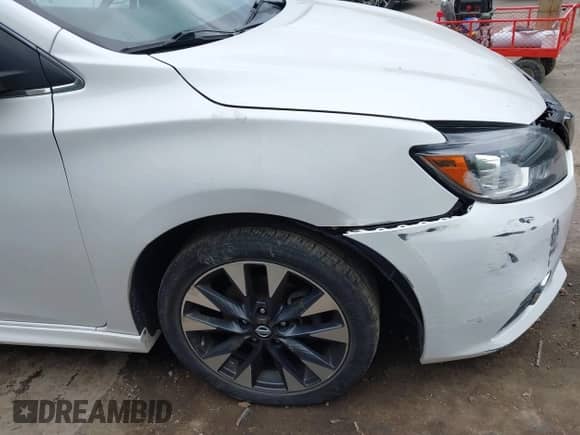 2017 Nissan Sentra SR z VIN 3N1AB7AP6HY400863, wystawiony jako IAAI lot #42268449 z przebiegiem 60 331 mil mil oraz . Historia ofert i sprzedaży dostępna na DreamBid. Obrazek 13.