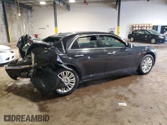 2014 Chrysler 300 C z VIN 2C3CCAKT4EH190409, wystawiony jako Copart lot #50275085 z przebiegiem 158 184 mil mil oraz Szkoda całkowita • Salvage title. Historia ofert i sprzedaży dostępna na DreamBid. Obrazek 3.
