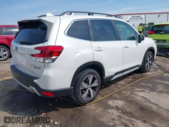 2020 Subaru Forester Touring with VIN JF2SKAXC3LH589349, listed as a IAAI auction lot 43154603 with 112,484 mi miles and . Bid and sale history available at DreamBid. Image 4.