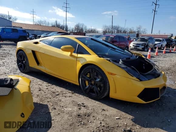 2014 Lamborghini Gallardo с VIN ZHWGU5BZ7ELA13923, выставлен на аукционе Copart как лот 82374714 с пробегом 33 260 миль миль и Списание • Salvage title. История ставок и продаж доступна на DreamBid. Изображение 4.