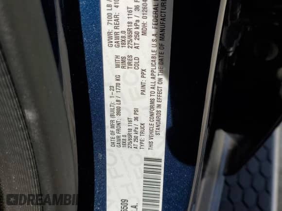 2023 Ram 1500 Big Horn with VIN 1C6SRFMT7PN556509, listed as a Copart auction lot 42938185 with 18,049 mi miles and Salvage title. Bid and sale history available at DreamBid. Image 14.