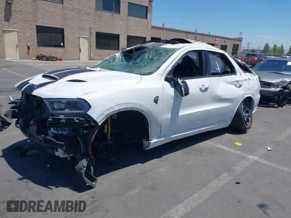 2021 Dodge Durango SRT Hellcat with VIN 1C4SDJH97MC689528, listed as a IAAI auction lot 37108149 with Not provided miles and . Bid and sale history available at DreamBid. Image 2.