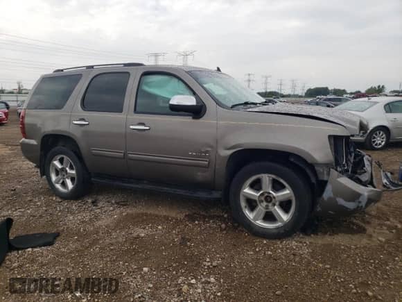 2011 Chevrolet Tahoe LS с VIN 1GNSKAE05BR179000, выставлен на аукционе Copart как лот 71307315 с пробегом 158 165 миль миль и Списание • Salvage title. История ставок и продаж доступна на DreamBid. Изображение 4.