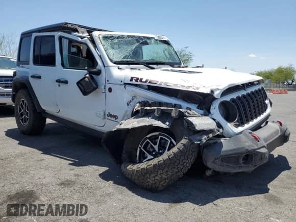 2024 Jeep Wrangler Rubicon z VIN 1C4PJXFG1RW300794, wystawiony jako Copart lot #60173765 z przebiegiem 22 652 mil mil oraz Czysty tytuł • Clean title. Historia ofert i sprzedaży dostępna na DreamBid. Obrazek 4.