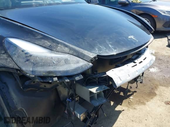 2022 Tesla Model Y Performance with VIN 7SAYGDEF7NF516418, listed as a IAAI auction lot 43222998 with 26,525 mi miles and . Bid and sale history available at DreamBid. Image 6.