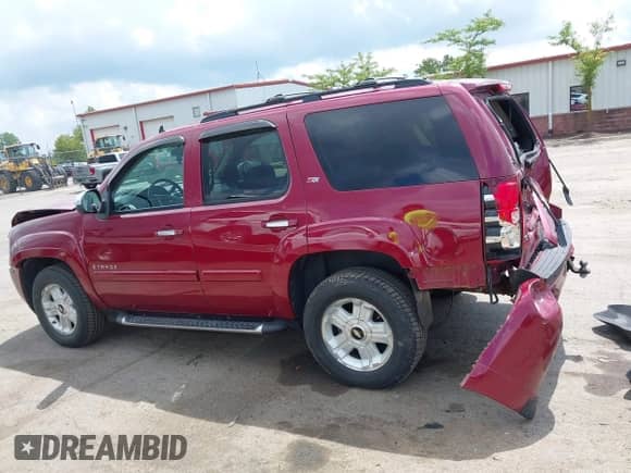 2007 Chevrolet Tahoe LS with VIN 1GNFK13087R424576, listed as a IAAI auction lot 42850609 with 96,099 mi miles and . Bid and sale history available at DreamBid. Image 14.