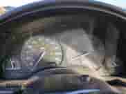 1999 Saturn SL z VIN 1G8ZF5281XZ150740, wystawiony jako Copart lot #86926374 z przebiegiem 170 051 mil mil oraz Czysty tytuł • Clean title. Historia ofert i sprzedaży dostępna na DreamBid. Obrazek 9.