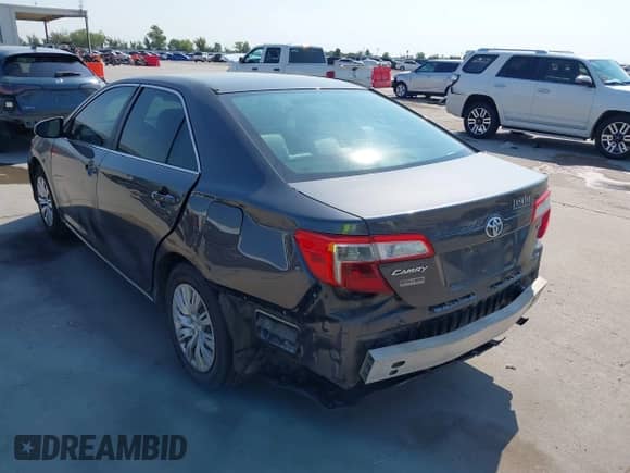 2013 Toyota Camry LE z VIN 4T4BF1FK3DR301982, wystawiony jako IAAI lot #43236342 z przebiegiem 241 526 mil mil oraz . Historia ofert i sprzedaży dostępna na DreamBid. Obrazek 3.