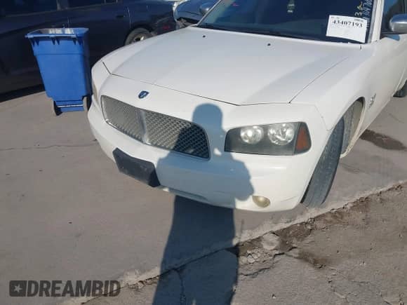 2007 Dodge Charger with VIN 2B3KA43G17H704768, listed as a IAAI auction lot 43407193 with 214,126 mi miles and . Bid and sale history available at DreamBid. Image 6.