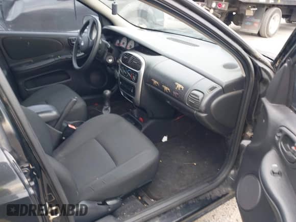 2004 Dodge Neon SXT with VIN 1B3ES56C04D523632, listed as a IAAI auction lot 43465097 with 192,028 mi miles and . Bid and sale history available at DreamBid. Image 5.