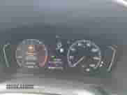 2025 Honda Pilot Touring with VIN 5FNYG2H70SB011614, listed as a IAAI auction lot 42205848 with 37,719 mi miles and . Bid and sale history available at DreamBid. Image 7.