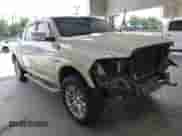 2014 Ram 1500 Longhorn z VIN 1C6RR7PM7ES353935, wystawiony jako IAAI lot #42781639 z przebiegiem 187 049 mil mil oraz . Historia ofert i sprzedaży dostępna na DreamBid. Obrazek 1.