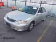 2003 Toyota Camry LE with VIN JTDBE32K130187036, listed as a IAAI auction lot 43504391 with 205,170 mi miles and . Bid and sale history available at DreamBid. Image 2.